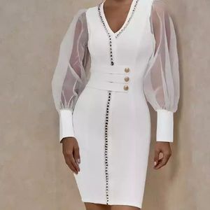 beautiful white dress with gold applications